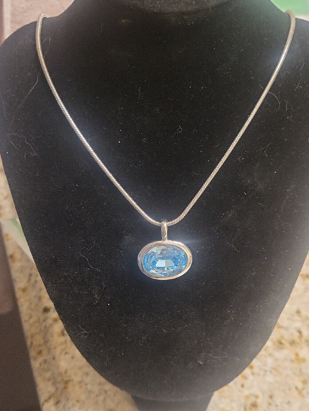 Silver Tone Necklace with Blue Aquamarine Simulant Oval Gemstone Pendant
